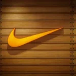 Nike store display showing various trainers and apparel.